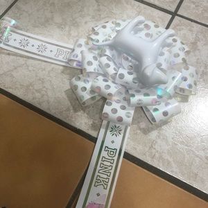Victoria secret pink bow prop with dog